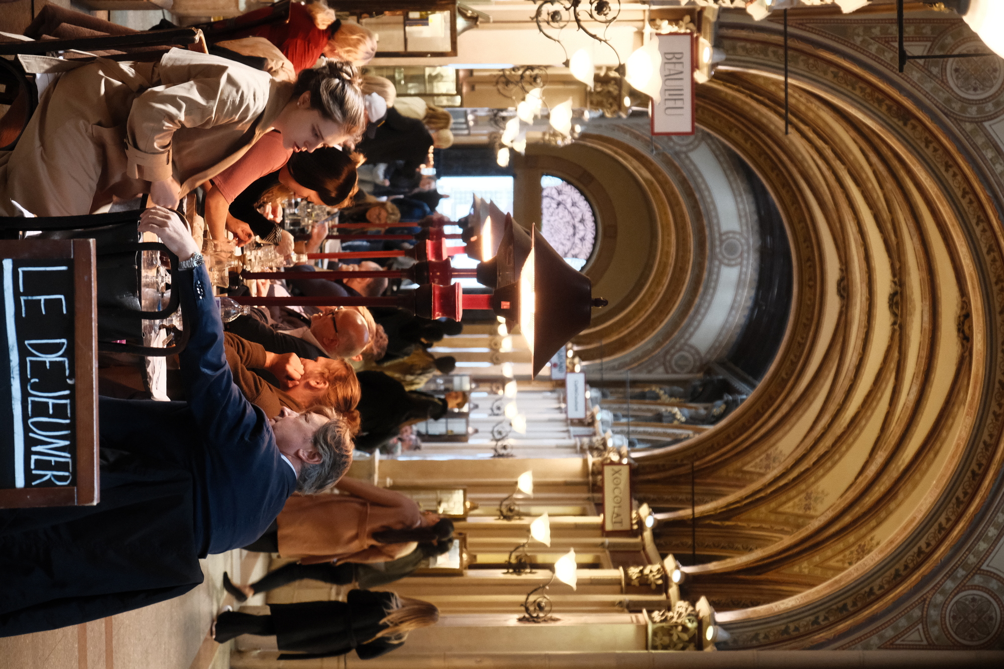 interior of the Palais Ferstel, with cafe seating